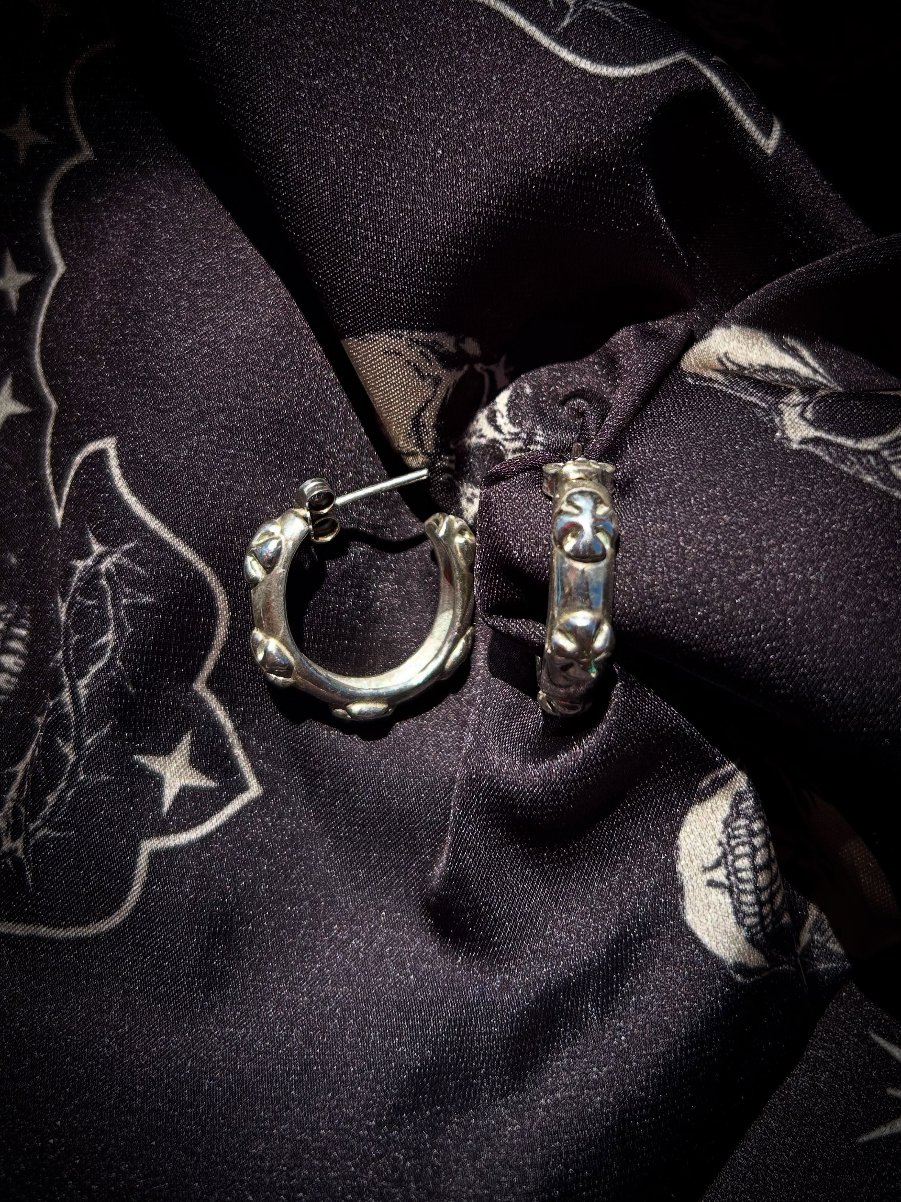 Chrome cross hoop earrings Secondary image