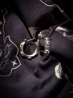 Chrome cross hoop earrings