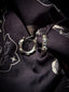Chrome cross hoop earrings